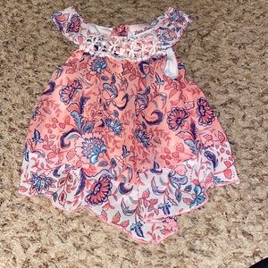 Cute layered tank top with crocheted neckline.